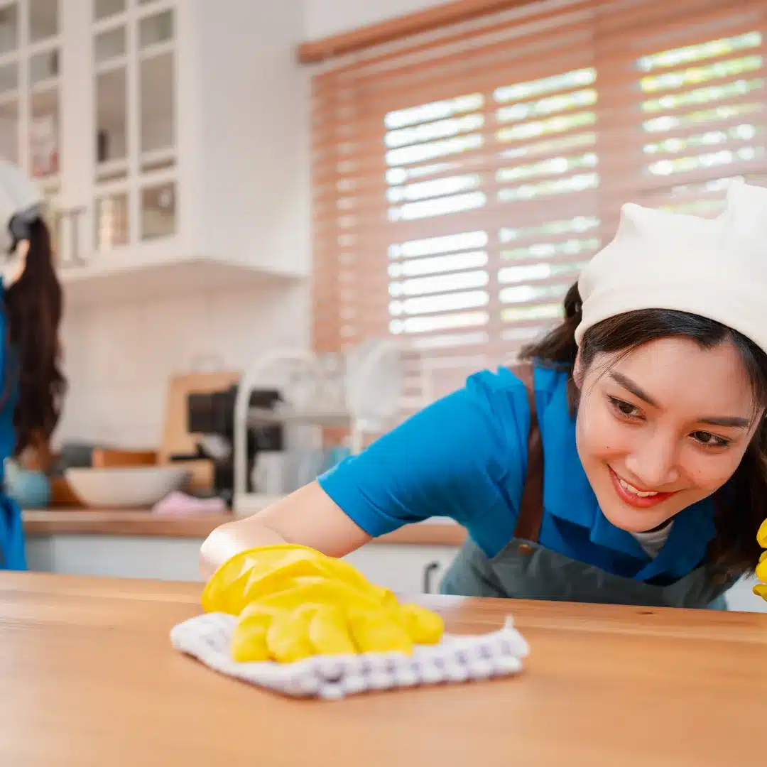 American Maid Service cleaner in Indian Summer, WA, with pet-safe cleaning products and warm cookies.